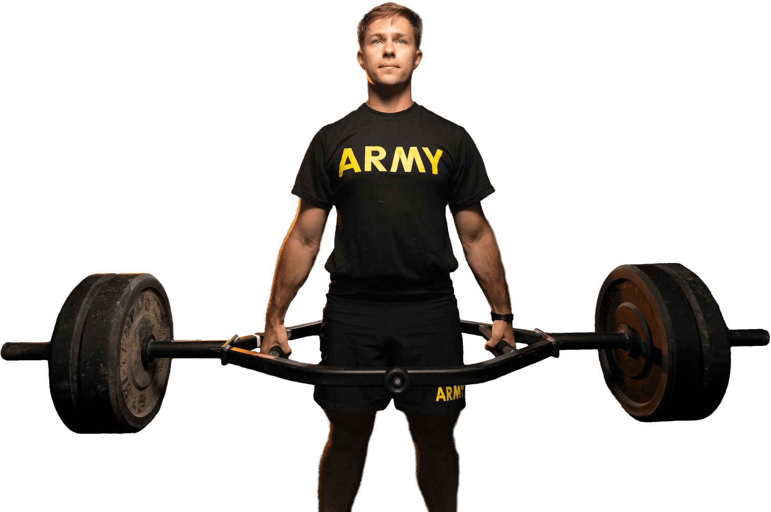 Soldier in an Army PT shirt holding a loaded hex bar before the AFT deadlift